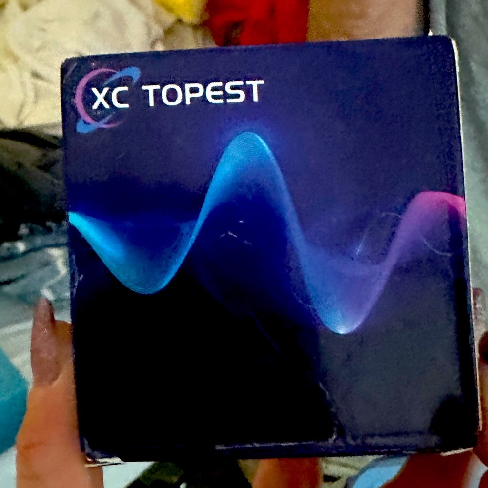 New opened box xc topest ear buds